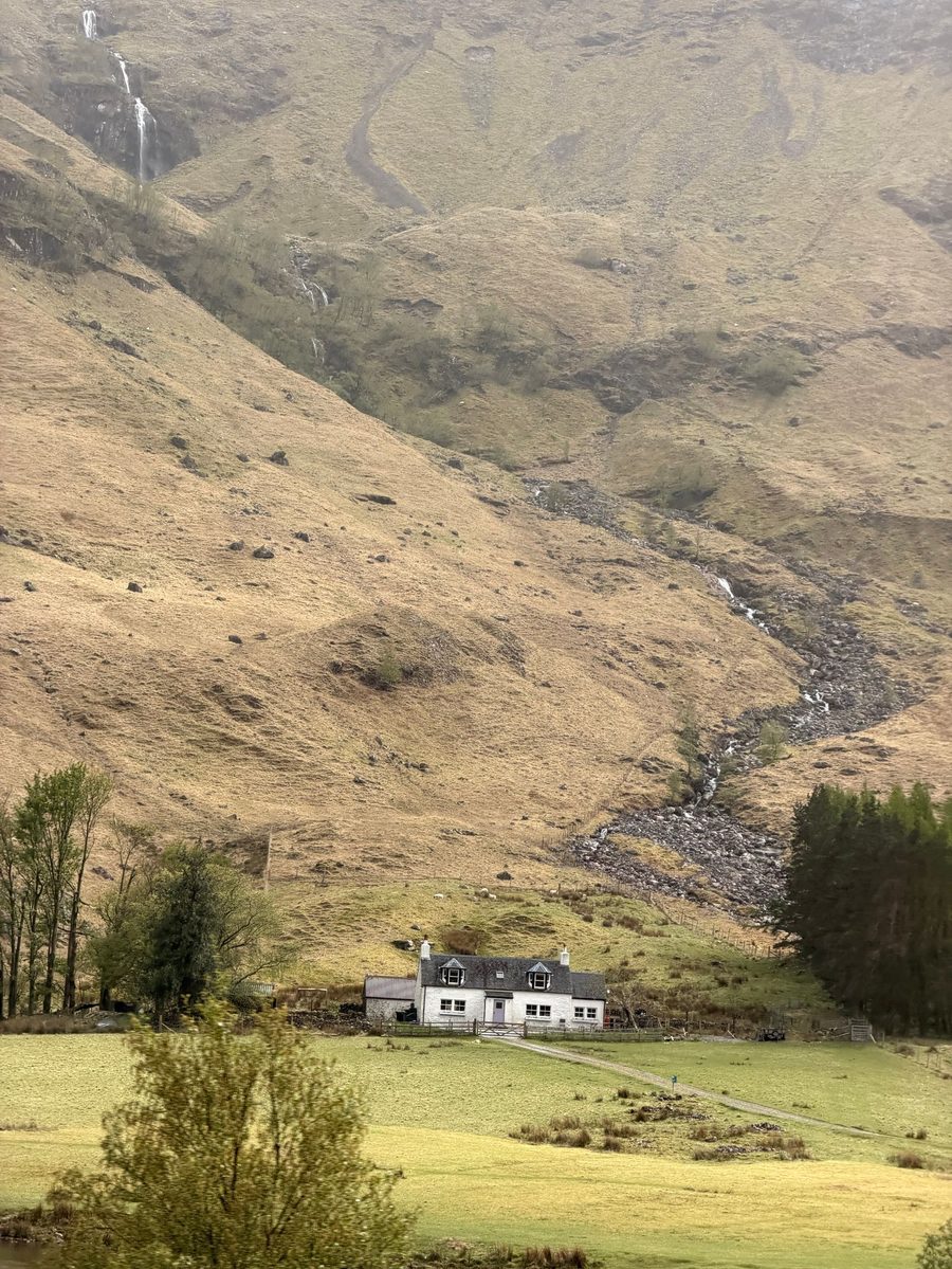 Highland glen with traditional cottage