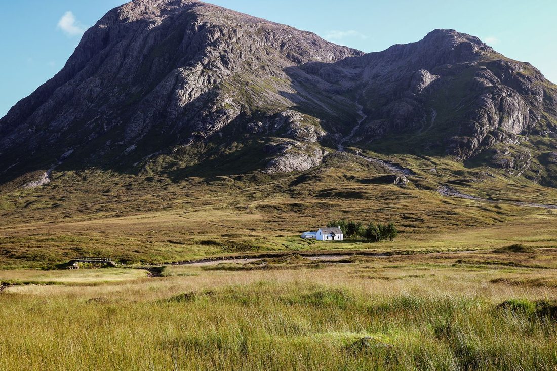 House beneath a Highland mountain